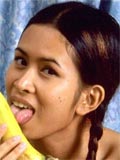 Naughty little asian slut eats banana and open her pussy wide