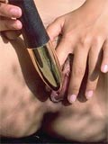 Hot asian plugs a gold dildo in her wet pussy