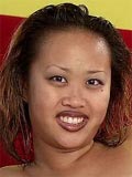 Smiling asian babe spreads her tight shaved pink pussy here