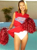Asian cheerleader shows her tiny shaved pussy