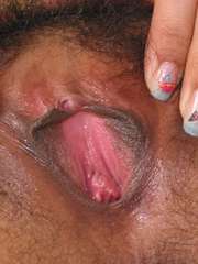 Beautiful Thai babe plugs a big dildo in her tight asian pussy