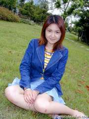 Lovely asian girl shows her sexy underwears and pussy in public park