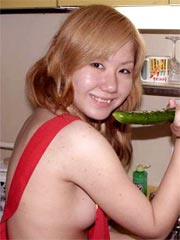 Naughty asian amateur teen puts carrot and cucumber in her tight pussy
