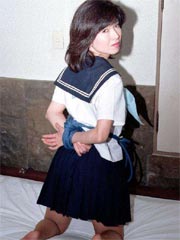 Shy japanese coed spreads her trimmed pussy