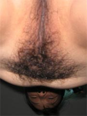 Naked Asian amateur wife opens her legs wide to show her hairy pussy