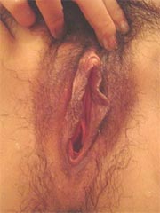 Asian amateur babe spreads wide her pussy