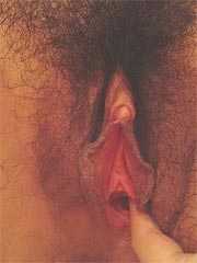 Asian amateur babe takes a shower and spreads wide her pussy