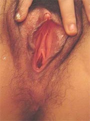 Asian amateur babe takes a shower and spreads wide her pussy