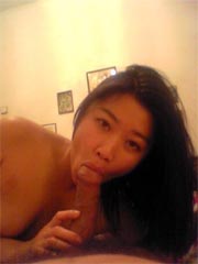 Hot asian girlfriend posing in miniskirt then sucks a hard cock