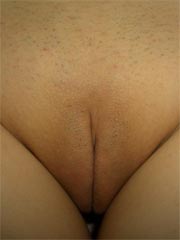 Shaved Asian teen shares her naked photos