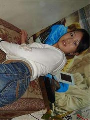 Asian teen shows her white panties and pussy