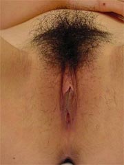 Nice picture set of a hot and horny naked Asian GF masturbating