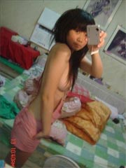 Selfmade sexy photos of cute Asian teen posing nude at home